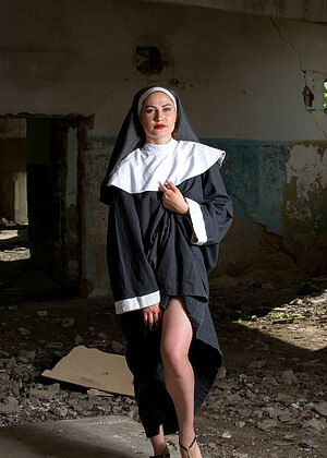 Stunning18 Judith Able Notable Stripping Nun Poto